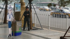 Policeman and advertisement, Beijing