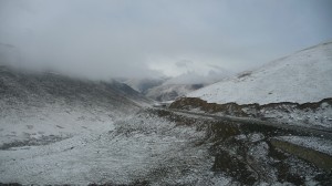 Mountains snow and road between Xining and Gyegu, 1