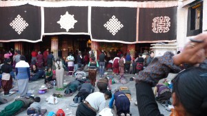 Pilgrims praying in front of Jokhang Temple